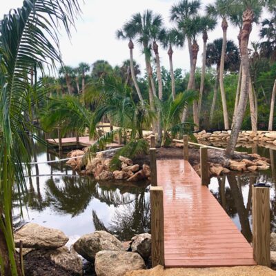 Custom Backyard pond dock, observation deck and bulkhead
