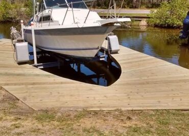 Custom cut out dock for special boat lift with no roof. Side mount boat lift