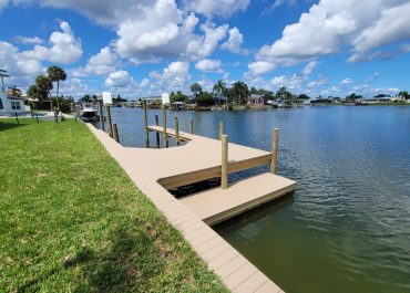 Seawall, skinny dock, boat slip and kayak launch deck