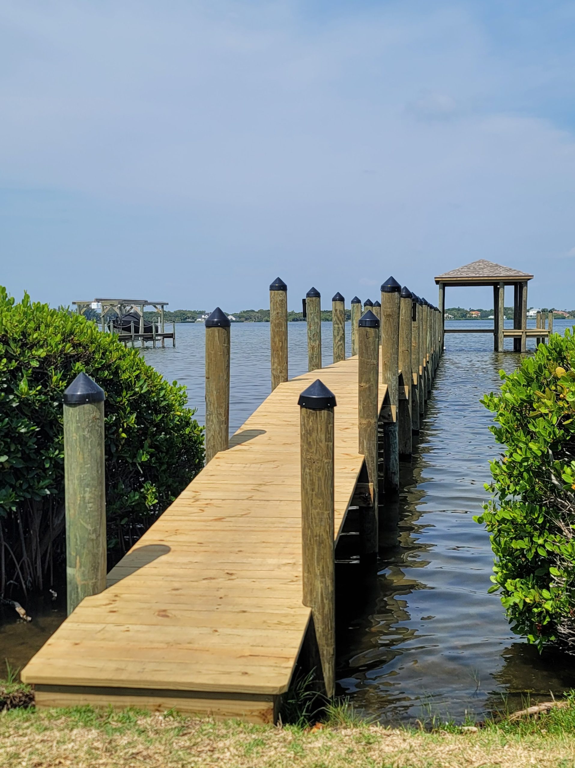 New natural wood dock installation