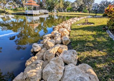 Coquina Seawall on a Lake in Orlando with Gazebo in background