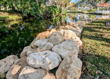Coquina Seawall on a Lake in Orlando with Gazebo in background