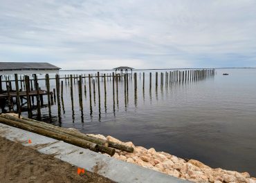 A picture of coquina seawall during installation by Integrity Marine