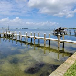 New Dock Pilings and Composite decking with Boat Slip